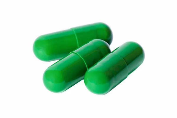 Τρεις Πράσινες Κάψουλες Φάρμακο Απομονωμένο Λευκό Φόντο Συμπλήρωμα Διατροφής — Φωτογραφία Αρχείου