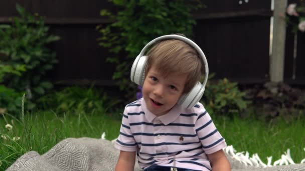 Handsome Smiling Boy Listening Music Headphones Children Technology Love Music — Stock Video