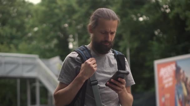 Elegant Man Checking Mail Mobile Phone While Walking Backpack Waiting — Stockvideo