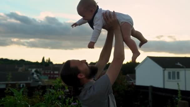 Happy Father Holding Adorable Baby Boy Embracing Kissing Smiling Dad — Stockvideo