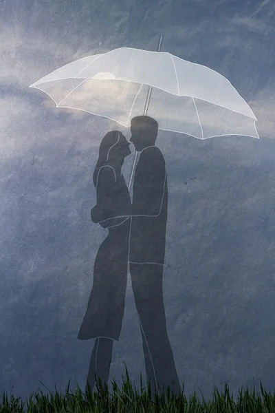 Casal sob guarda-chuva — Fotografia de Stock