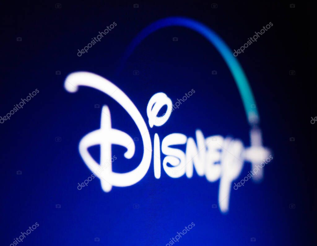 Kyiv, Ukraine -  March 9, 2021: Disney logo on the screen. The Walt Disney Company, commonly known as Disney, is an American diversified multinational mass media and entertainment conglomerate.