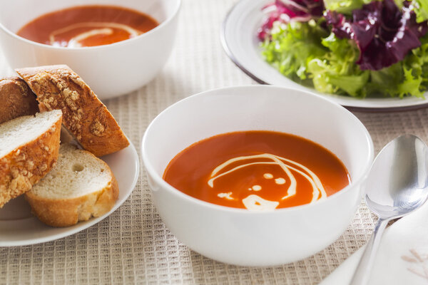 Tomato soup with side salad and crusty bread
