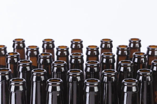 Brown glass beer bottles still life on white background — Stock Photo, Image