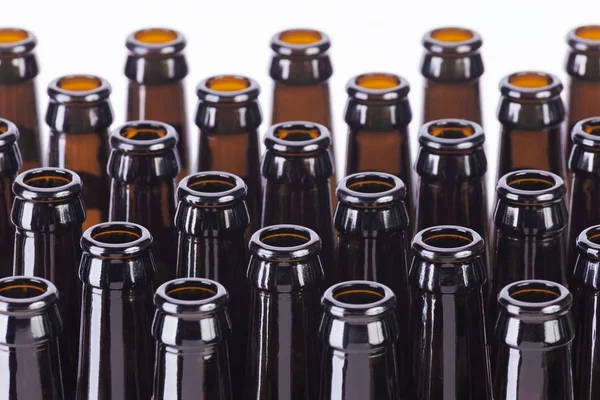 Brown glass beer bottles still life on white background — Stock Photo, Image