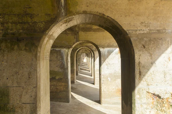 Concrete arches manmade structure, abstract pattern — Stock Photo, Image