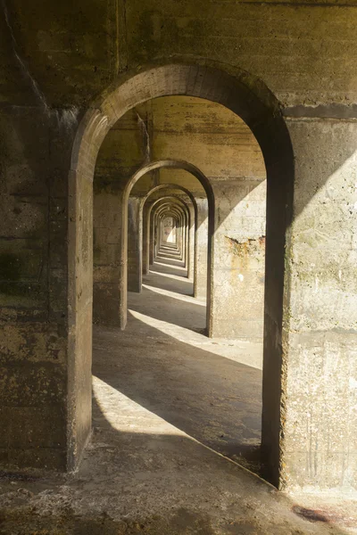 Concrete arches manmade structure, abstract pattern — Stock Photo, Image