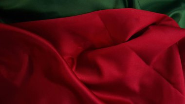 Kopya alanını karşılamak için soyut kırmızı ve yeşil kumaş arkaplanı