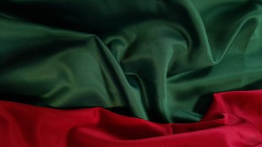 Kopya alanını karşılamak için soyut kırmızı ve yeşil kumaş arkaplanı