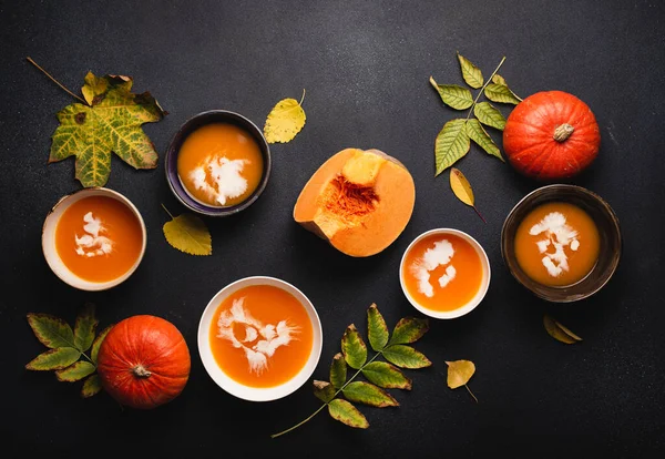 Plates with cream pumpkin soup — Stock Photo, Image