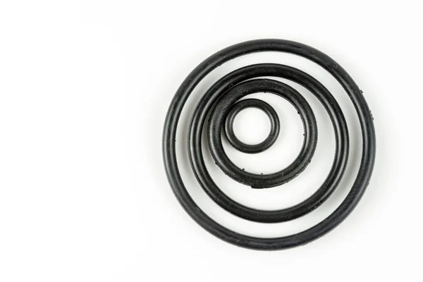 Černé Hydraulické Pneumatické Kroužky Různých Velikostech Bílém Pozadí Kroužky Pro — Stock fotografie