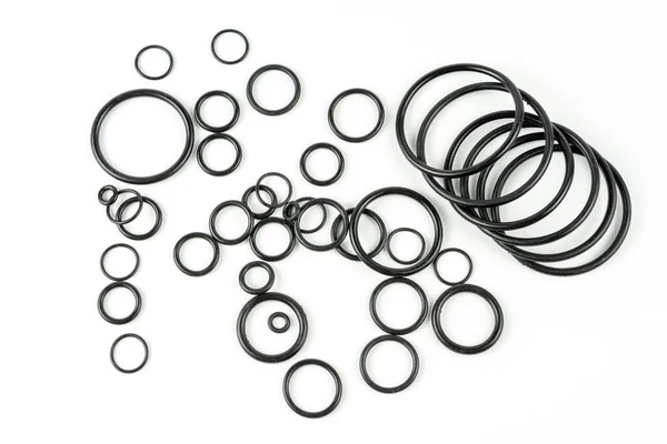 Fekete Hidraulikus Pneumatikus Gyűrűk Különböző Méretben Fehér Alapon Gyűrűk Hidraulikus — Stock Fotó