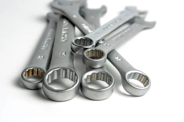 Several Open Metal Keys Pile Close White Background — Fotografia de Stock