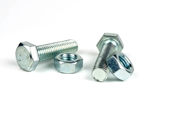 Several Bolts Nuts Made Silver Metal Close Isolated White Background — Stock Photo, Image