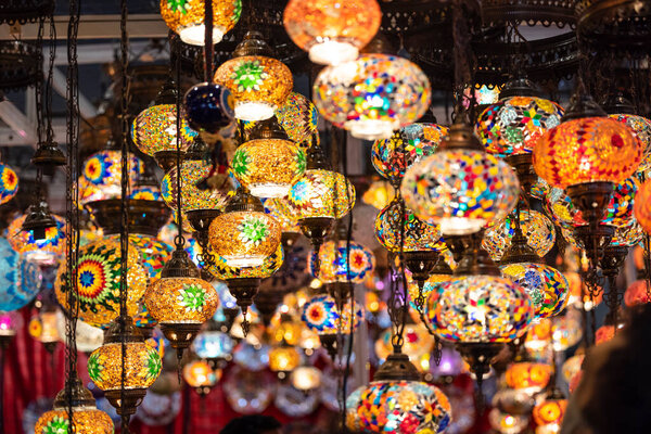 Oriental colorful glass hanging lamps or lanterns artistic selective focus background.