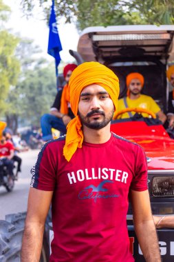 Anandpur Sahib, Punjab, India - March 2022: Portrait of sikh male (Nihang Sardar) during the celebration of Hola Mohalla at Anandpur Sahib on holi festival.