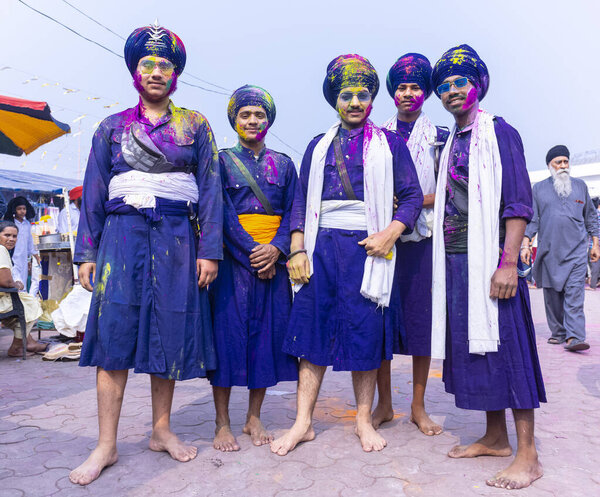 Anandpur Sahib, Punjab, India - March 2022: Portrait of sikh male (Nihang Sardar) during the celebration of Hola Mohalla at Anandpur Sahib on holi festival.