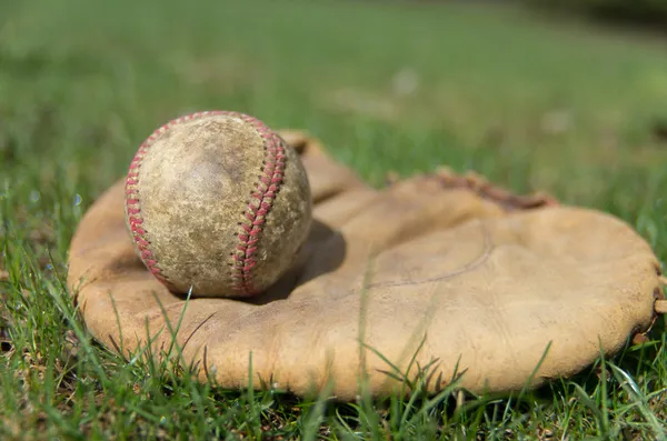 Old Baseball and Glove Stock Image
