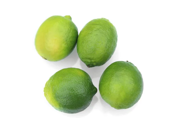 Verse Groene Limoenen Tropisch Fruit Witte Achtergrond — Stockfoto
