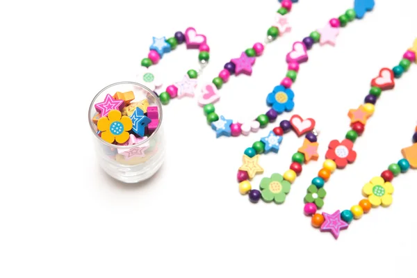 Kids beaded jewellery isolated on white — Stock Photo, Image