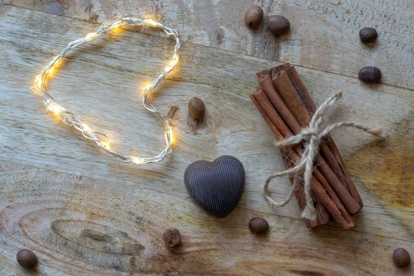 Chocolate Heart Cinnamon Coffee Beans Glowing Heart Wooden Background — Stock Photo, Image