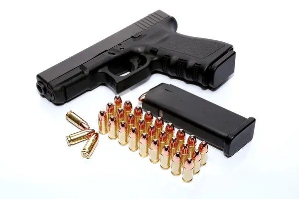 Gun with magazine and ammo — Stock Photo, Image