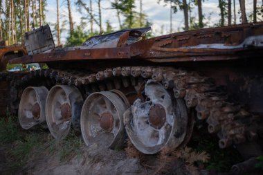 The destroyed and burned modern tank of the russian army in Ukraine in the war in 2022