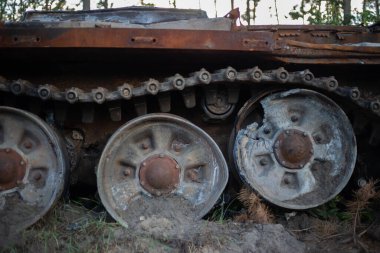 The destroyed and burned modern tank of the russian army in Ukraine in the war in 2022