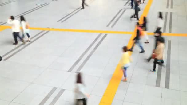 Aerial view of people walking on passageway — Stock Video