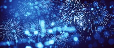 Bokeh özgeçmişi olan renkli bir havai fişek. Yeni yıl kutlaması, soyut tatil geçmişi