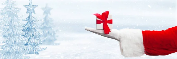 Der Weihnachtsmann Mit Einem Geschenk Frohe Weihnachten Kompositionskonzept — Stockfoto