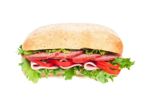 Помідор, салямі та бутерброд з перцем — стокове фото