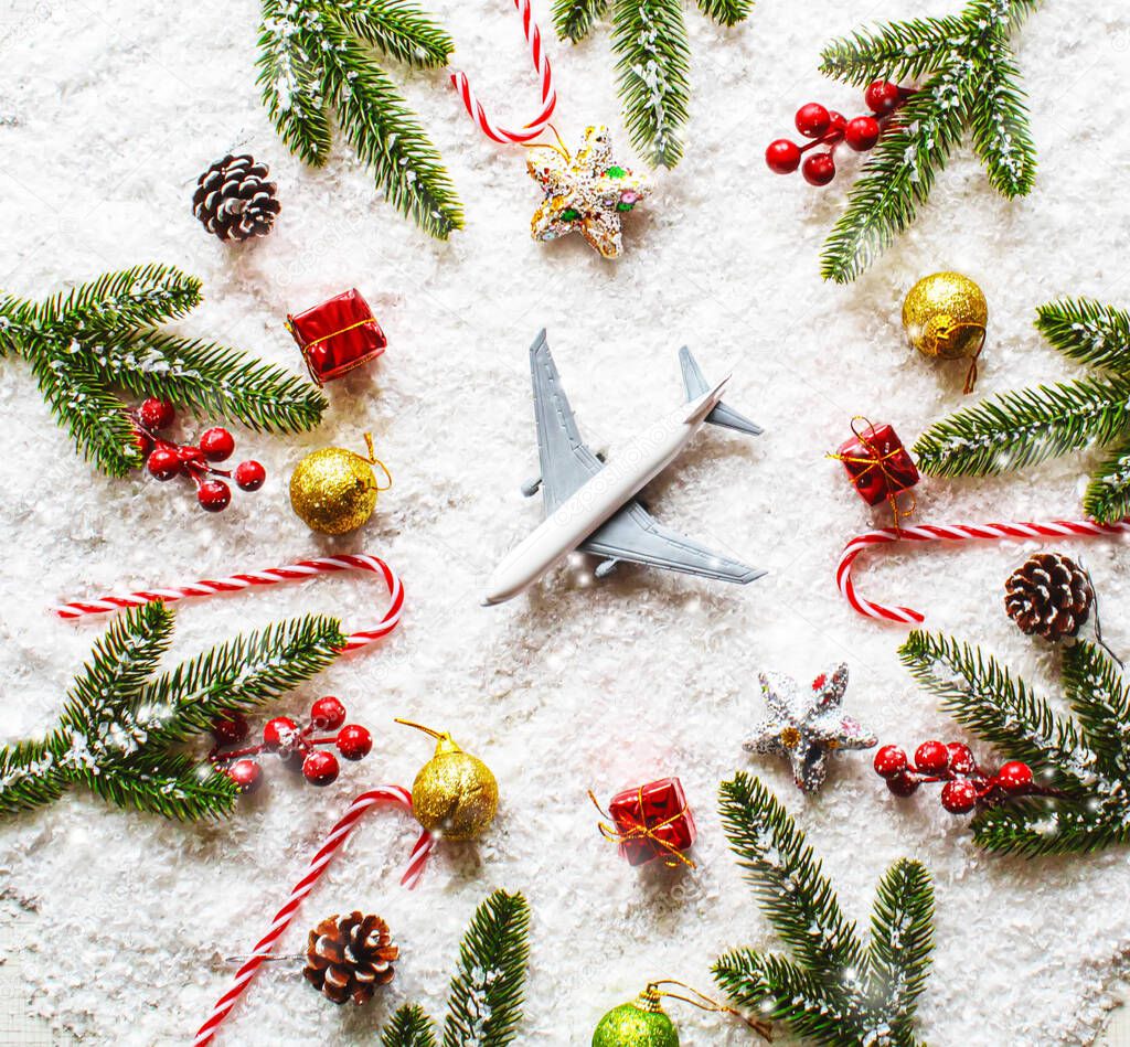 Travel for Christmas. Airplane with Christmas decor.New year.Selective focus.holidays