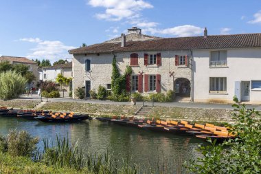 Coulon town in France. River view. Deux Sevres, New Aquitaine region. clipart