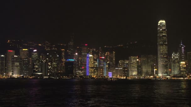 Hong kong skyline in de avond — Stockvideo