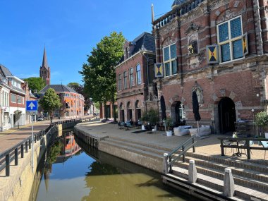 Canal next to the city hall in Bolsward Friesland the Netherlands