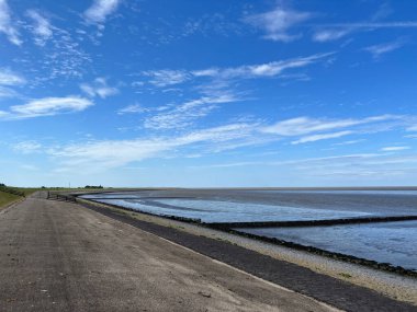 Sea dyke and the Wadden sea around Zurich in Friesland the Netherlands
