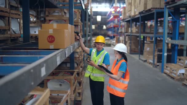 Young Asian Woman Worker Using Barcode Scanner Checking Goods Box — Stok Video