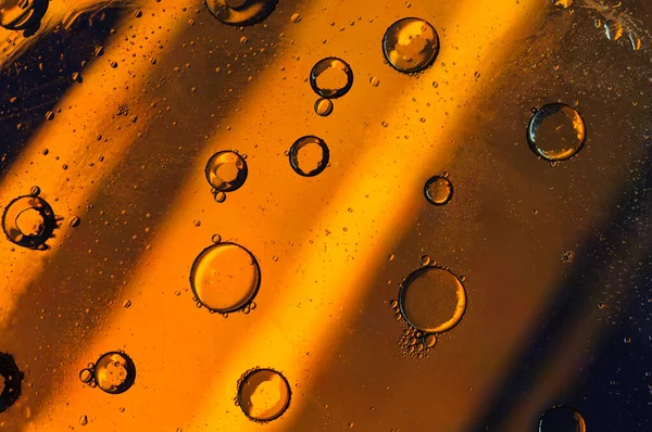 Dark Abstract Background Oil Water Bubbles Surface Water Orange Yellow — Fotografia de Stock
