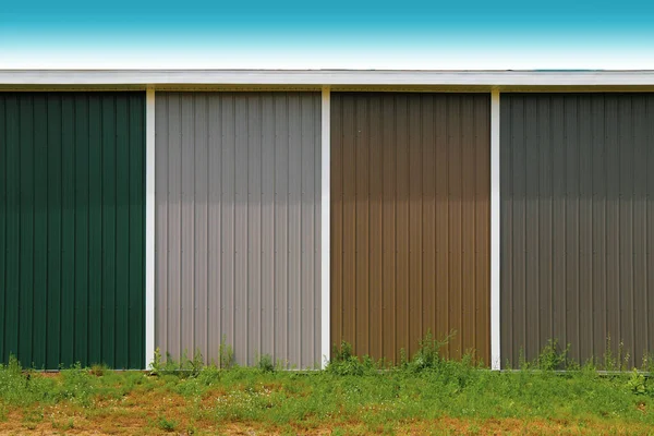 a warehouse painted multicolored steel shelter building vinyl siding structure new design