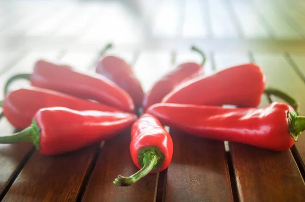 Bright red pepper on the table — Stock Photo, Image