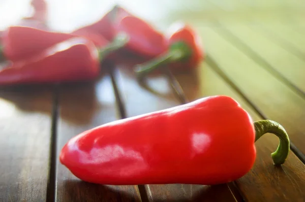 Bright red pepper on the table — Stock Photo, Image