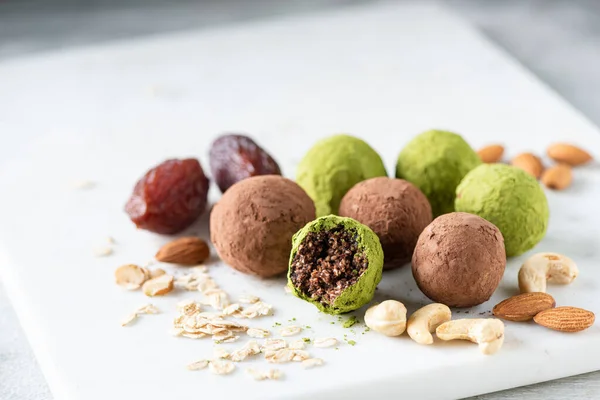 Healthy energy balls with dates and nuts — Stock Photo, Image