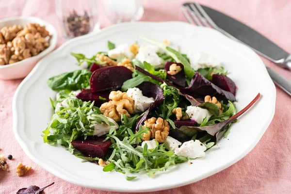 Beetroot salad with goats cheese and walnuts Stock Picture