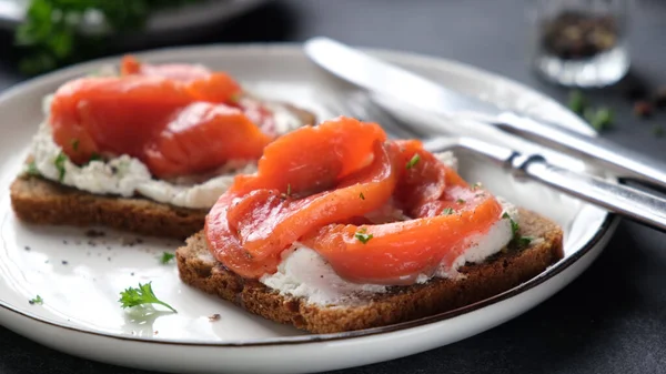 Rye bread toast with cream cheese and smoked salmon Stock Image