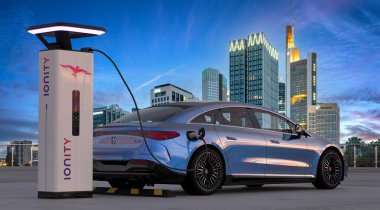 Electric, luxurious Mercedes EQS while charging with IONITY charger