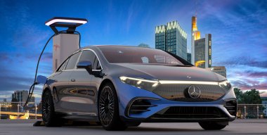 Electric, luxurious Mercedes EQS while charging with IONITY charger