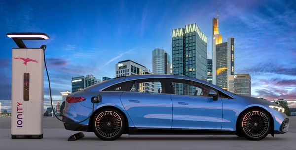 Electric, luxurious Mercedes EQS while charging with IONITY charger