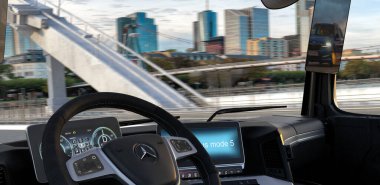 View from behind the steering wheel on the cockpit of a new electric Mercedesa E-ACTROS truck