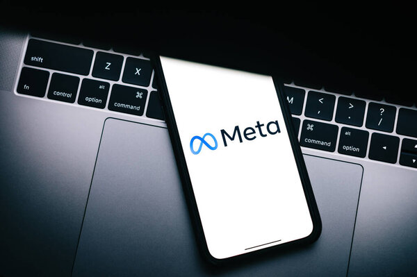 Meta logo on the smartphone screen.